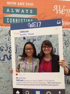Two women holding a Instagram sign for WE17