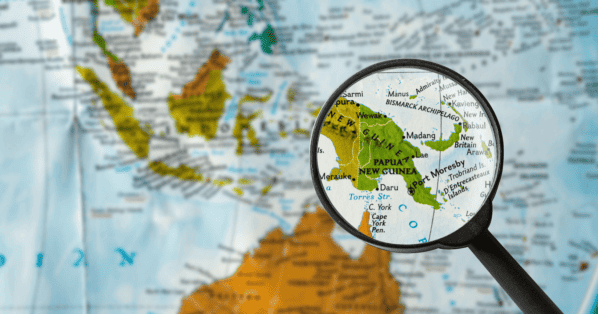 Map of Papua New Guinea with a magnifying glass over it