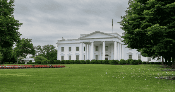 Landscape color photo of the White House and White House lawn