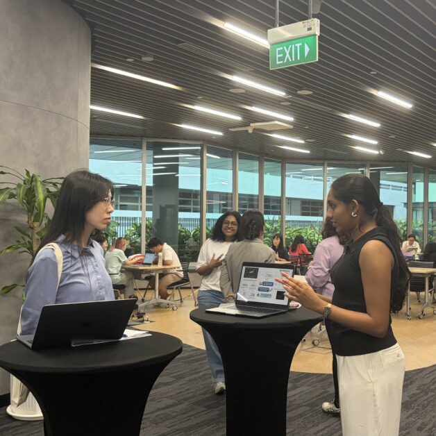 Researchers presenting their work