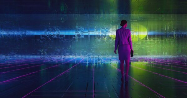stock photo of woman engineer standing in front of technology